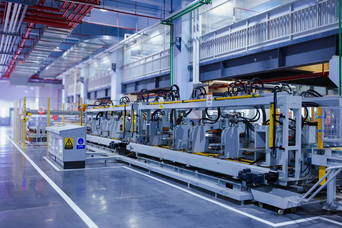 Production line in a bright industrial hall